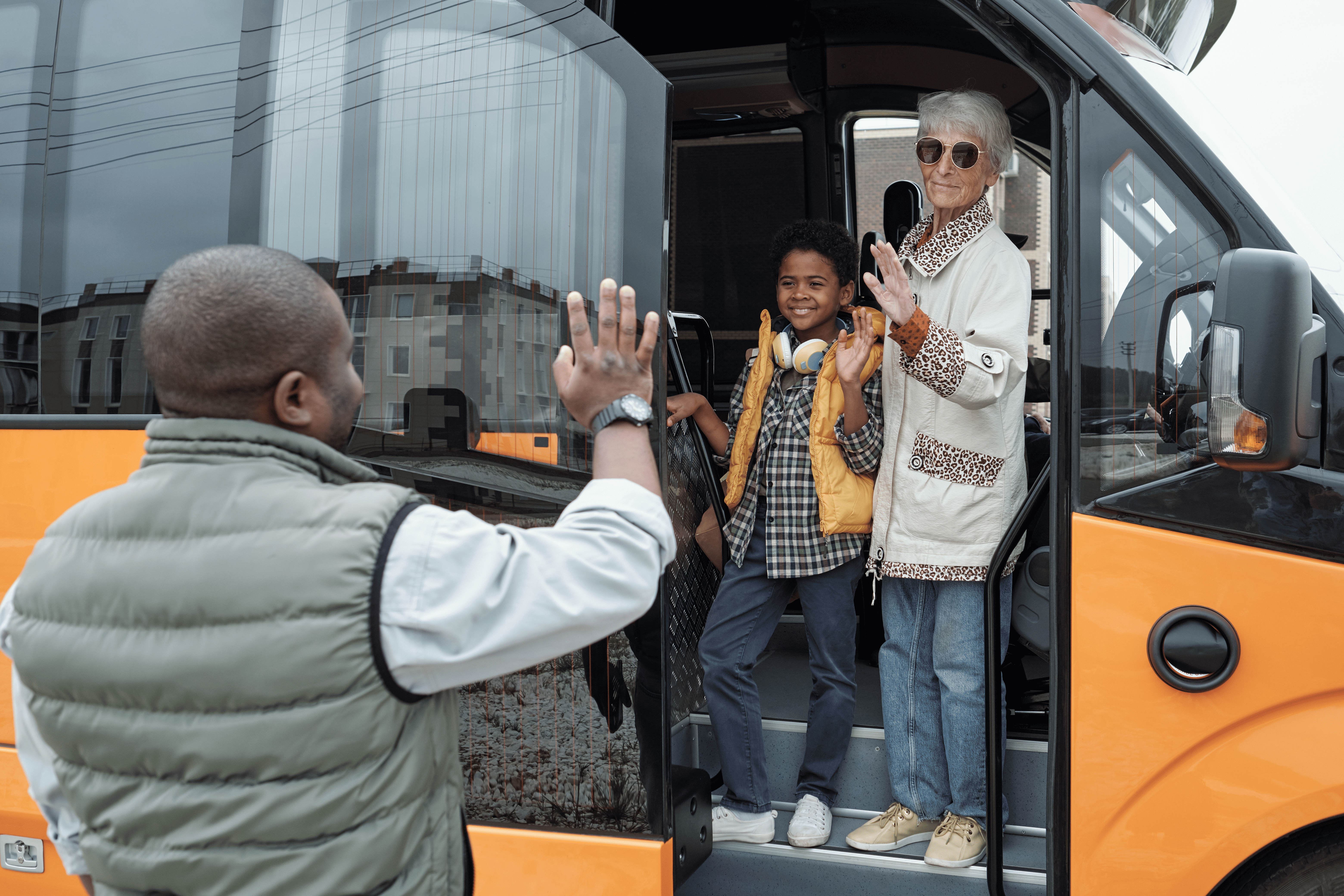 Students boarding a safe school taxi near Luton